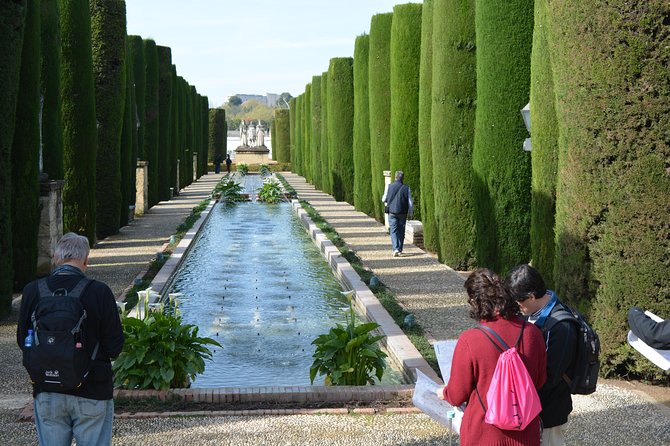 Cordoba Monuments Intensive Tour in English Tickets included - The Alcázar: fortress walls and garden paths