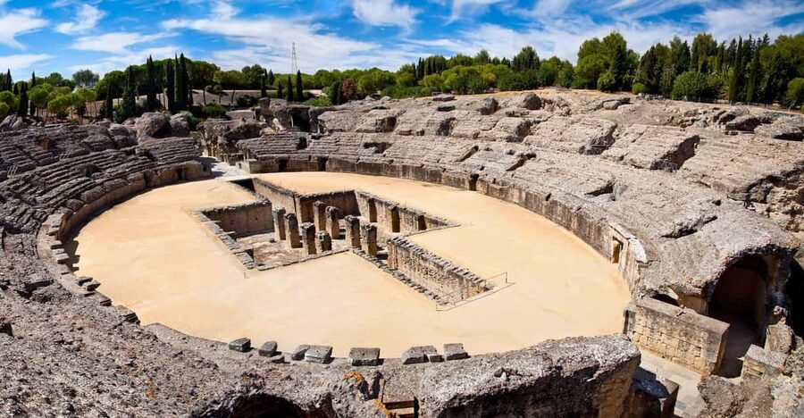 From Seville: Half-Day Guided Bike Trip to Italica - Leaving Seville by bike