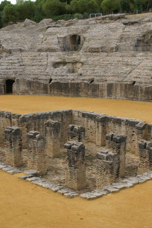 From Seville: Half-Day Guided Bike Trip to Italica - Walking through ancient Itálica