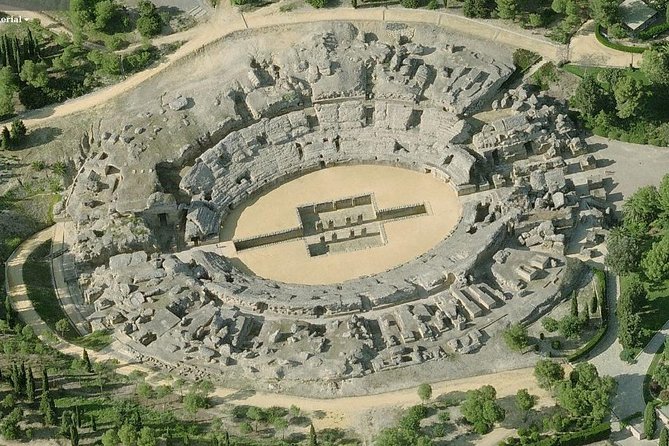 Historical Italica: Half-Day Guided Tour from Seville - The amphitheater is the big moment