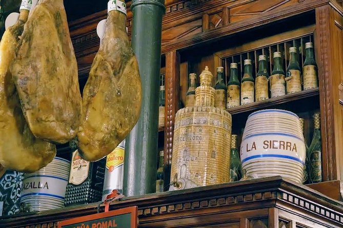 Sevilla Food Tour: Tapas, Wine, History & Traditions - Santa Cruz closes with meatballs, sweets, and PX