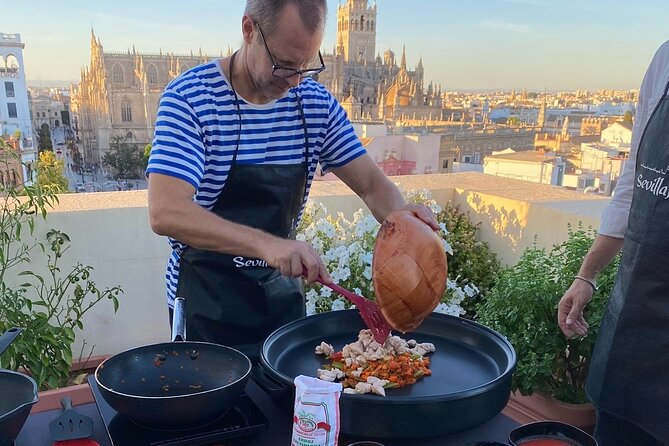 Sevilla: Rooftop Paella Cooking Class & 30-minute expert Q&A - Booking and timing notes