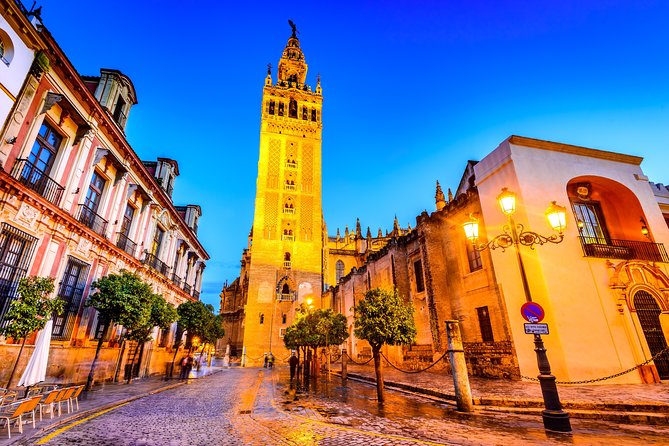Seville: Cathedral & Giralda Guided Tour with Tickets - Patio de los Naranjos and Puerta del Perdón