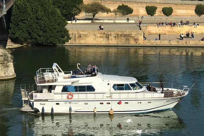 Seville: Cruise along the Guadalquivir River with appetizer - A river-level view of Seville