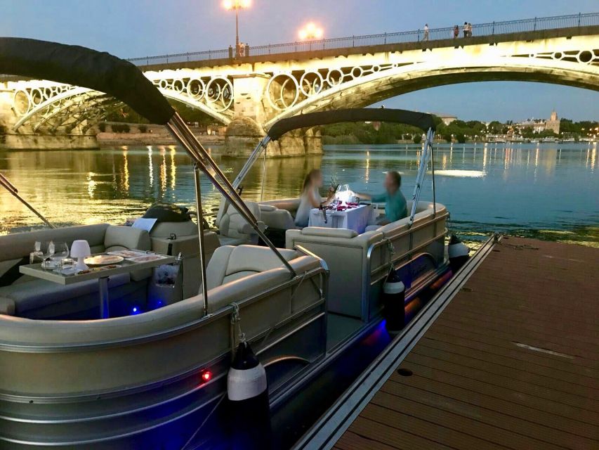 Seville: Exclusive River Boat Tour with Tapas - Triana Bridge and the historic riverfront
