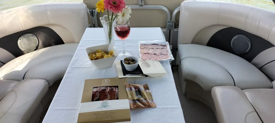 Seville: Exclusive River Boat Tour with Tapas - Boarding on the Triana side