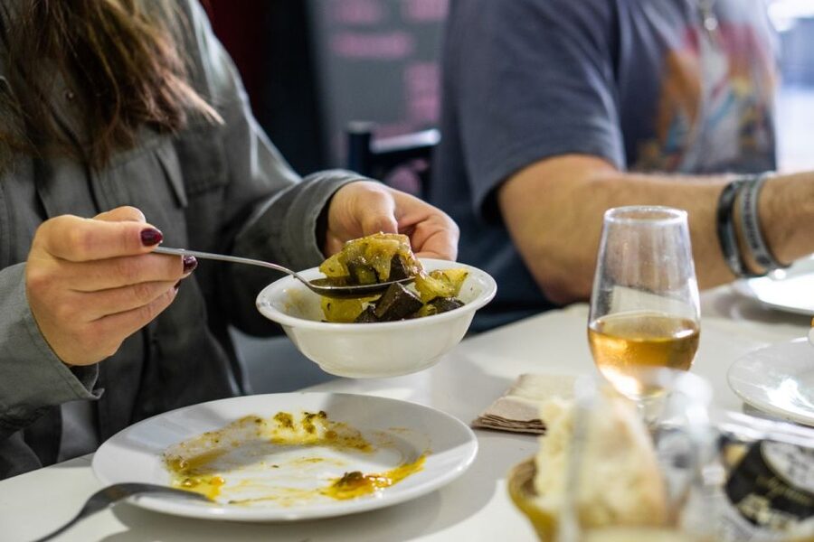 Seville: Flavors of Andalucía Guided Food Tour with Tastings - Two taverns, unfamiliar tapas and local drinks