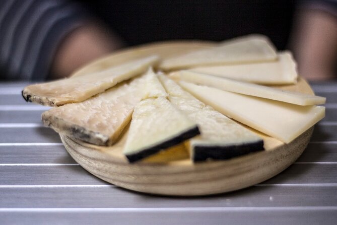 Seville Food Tour: Vermut, Churros & 10+ Tasty Local Dishes - Crossing the river into Triana