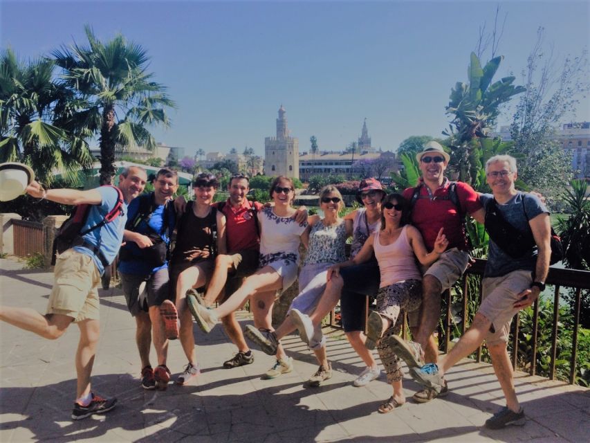 Seville: Highlights Bike Tour with Local Guide - The riverfront and San Telmo Palace