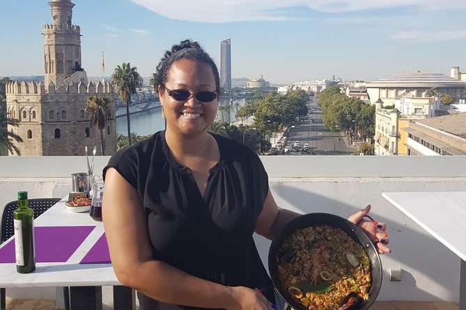 Seville: Paella Showcooking Experience - Booking and practical details
