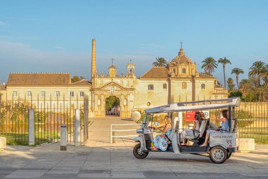 Seville: Private City Tour by Eco Tuk Tuk - From the Arjona car park to Triana