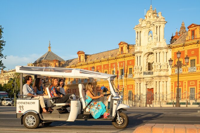 Tour Welcome Seville with Local Guide in Eco Tuk Tuk Private - Civic landmarks and the old tobacco works
